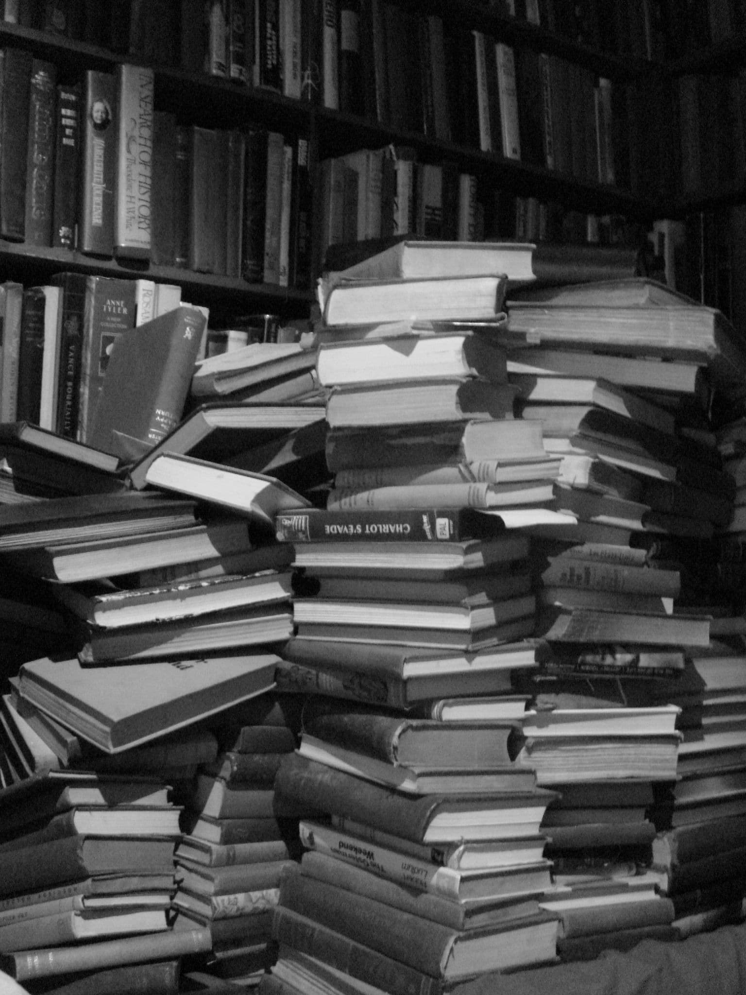 A stack of old and new books.