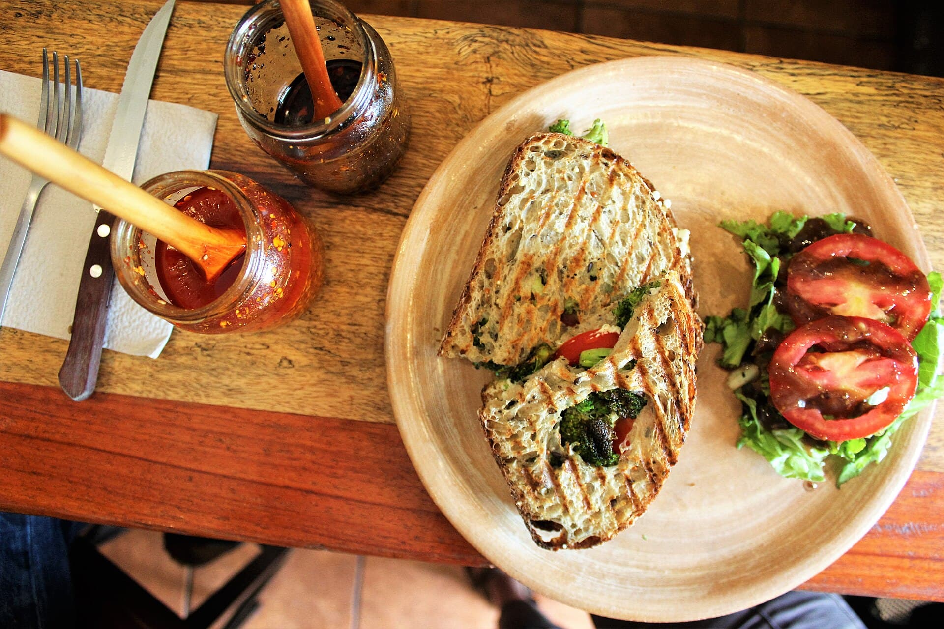 A vegetarian sandwich on a plate, the sort of lunch that can still go wrong if you eat it in a rush.