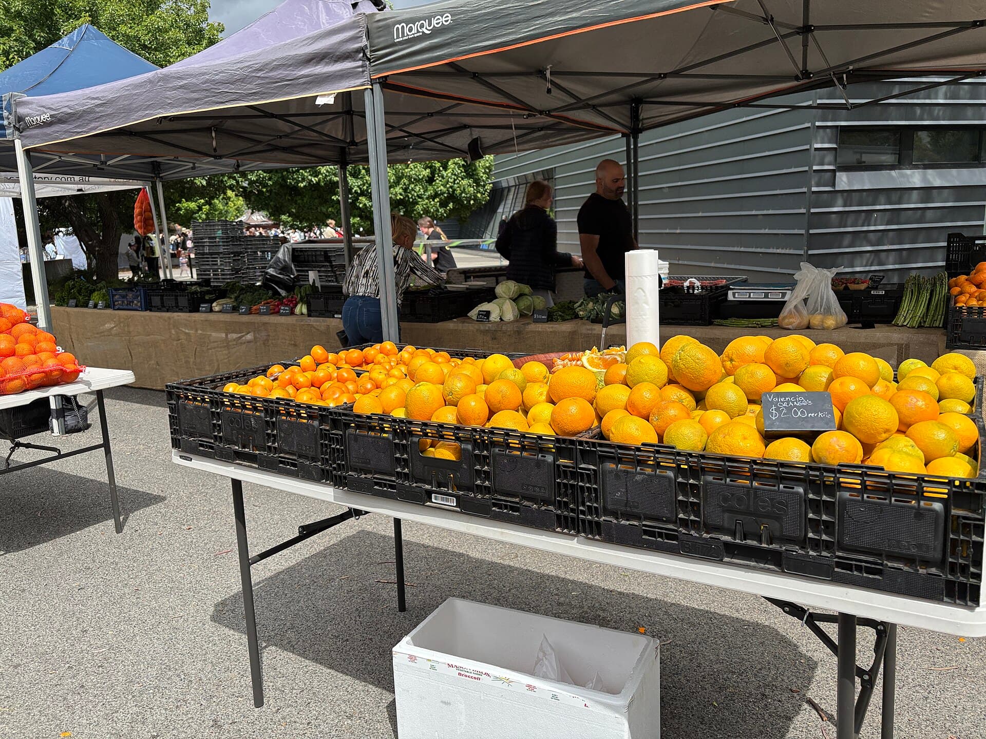 Fruit and vegetables on an outdoor market stall.